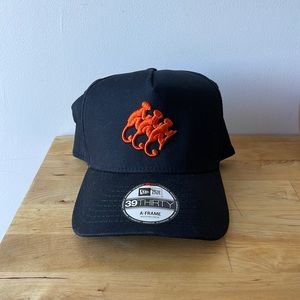 New Era A-Frame hat features Monkey Shoulder logo.
